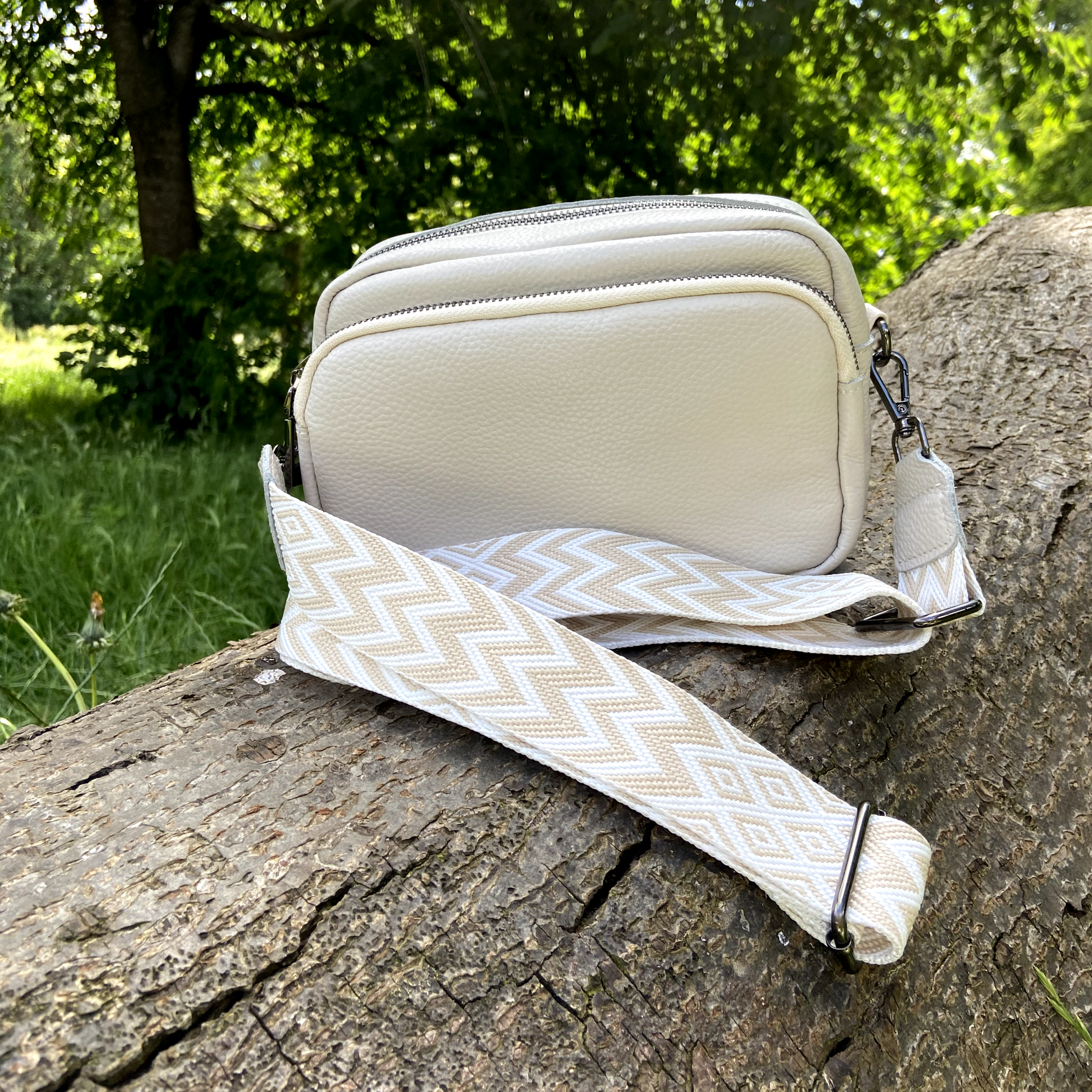 The Éclat – Bolso bandolera de piel y accesorios